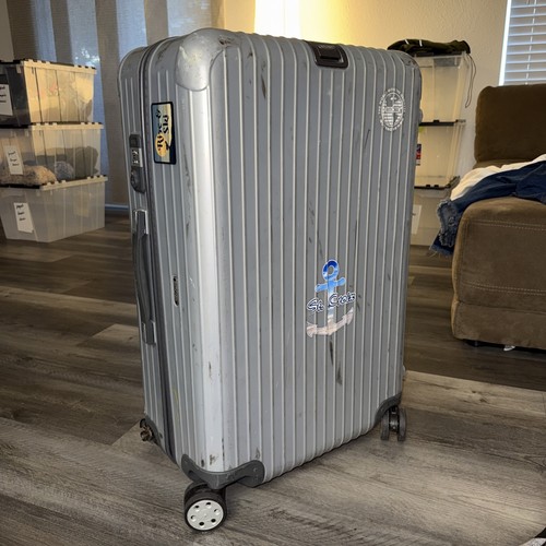 Rimowa plastic rolling luggage - rolling,